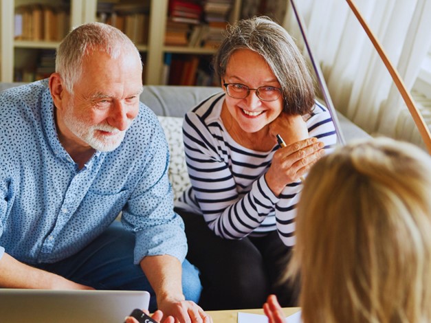 couple discussing options with an advisor
